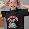 “Just Visiting” UFO Graphic Youth Shirt - Funny Alien Flamingo Pool Float Youth Tee | Retro Summer Vacation T-Shirt | LAHall Artworks (Copy)