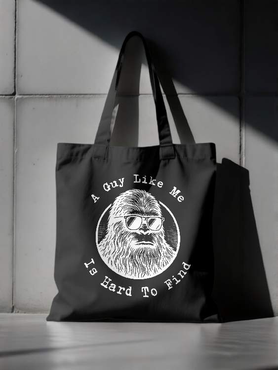 "A Guy Like Me Is Hard To Find" -Bigfoot in Sunglasses Tote  | LAHall Artworks Graphic Tote