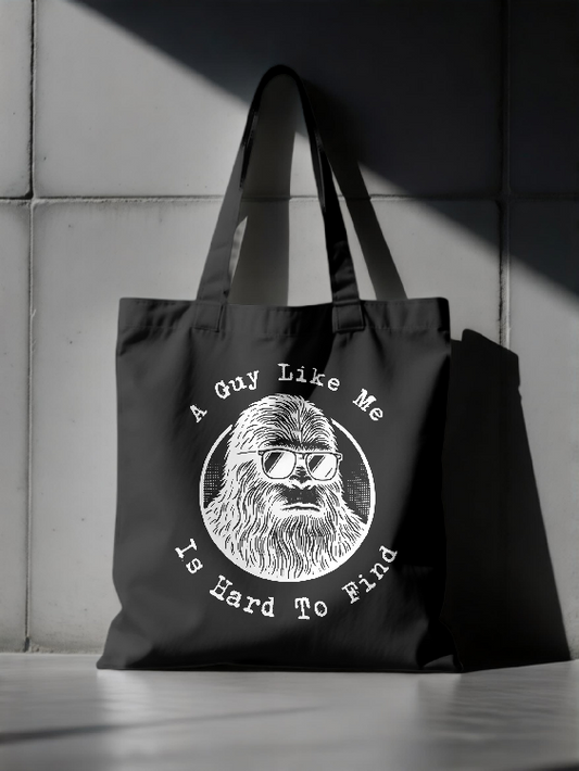 Bigfoot Sunglasses Tee A Guy Like Me Is Hard To Find | LAHall Artworks Graphic Tote
