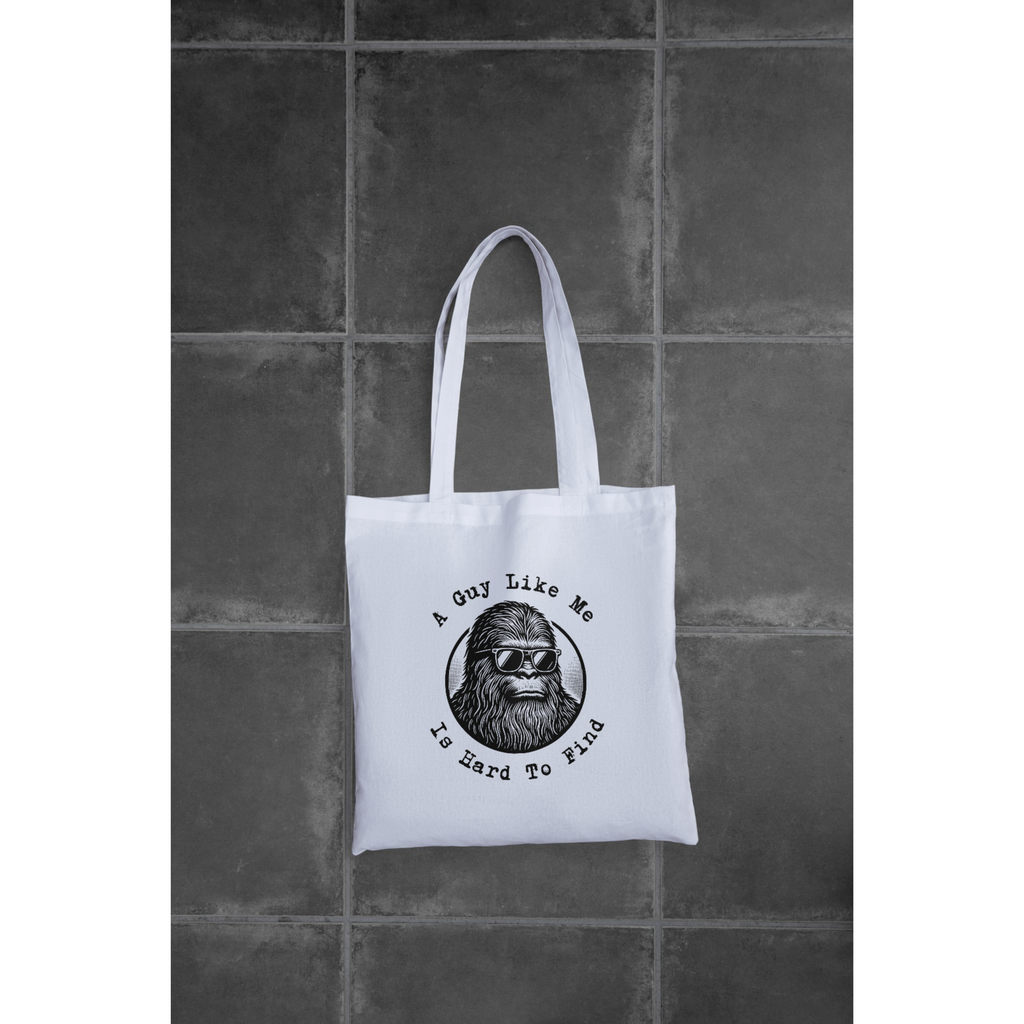 "A Guy Like Me Is Hard To Find" -Bigfoot in Sunglasses Tote  | LAHall Artworks Graphic Tote
