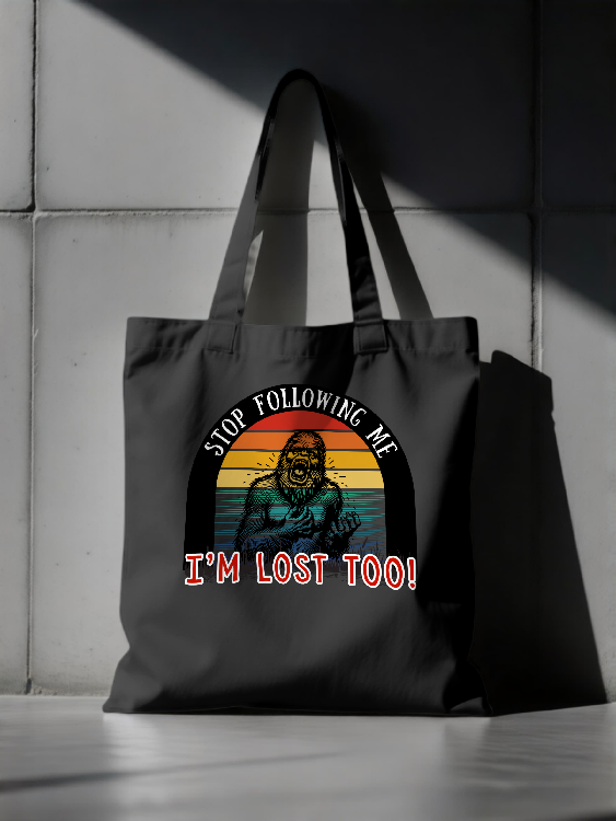 "Stop Following Me I’m Lost Too" Bigfoot Graphic Tote  | LAHall Artworks Cryptid Tote Bag