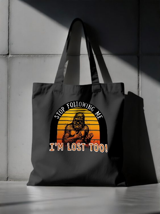 Bigfoot Stop Following Me I’m Lost Too Graphic Tee (Warm Tones) | LAHall Artworks Cryptid Tote Bag