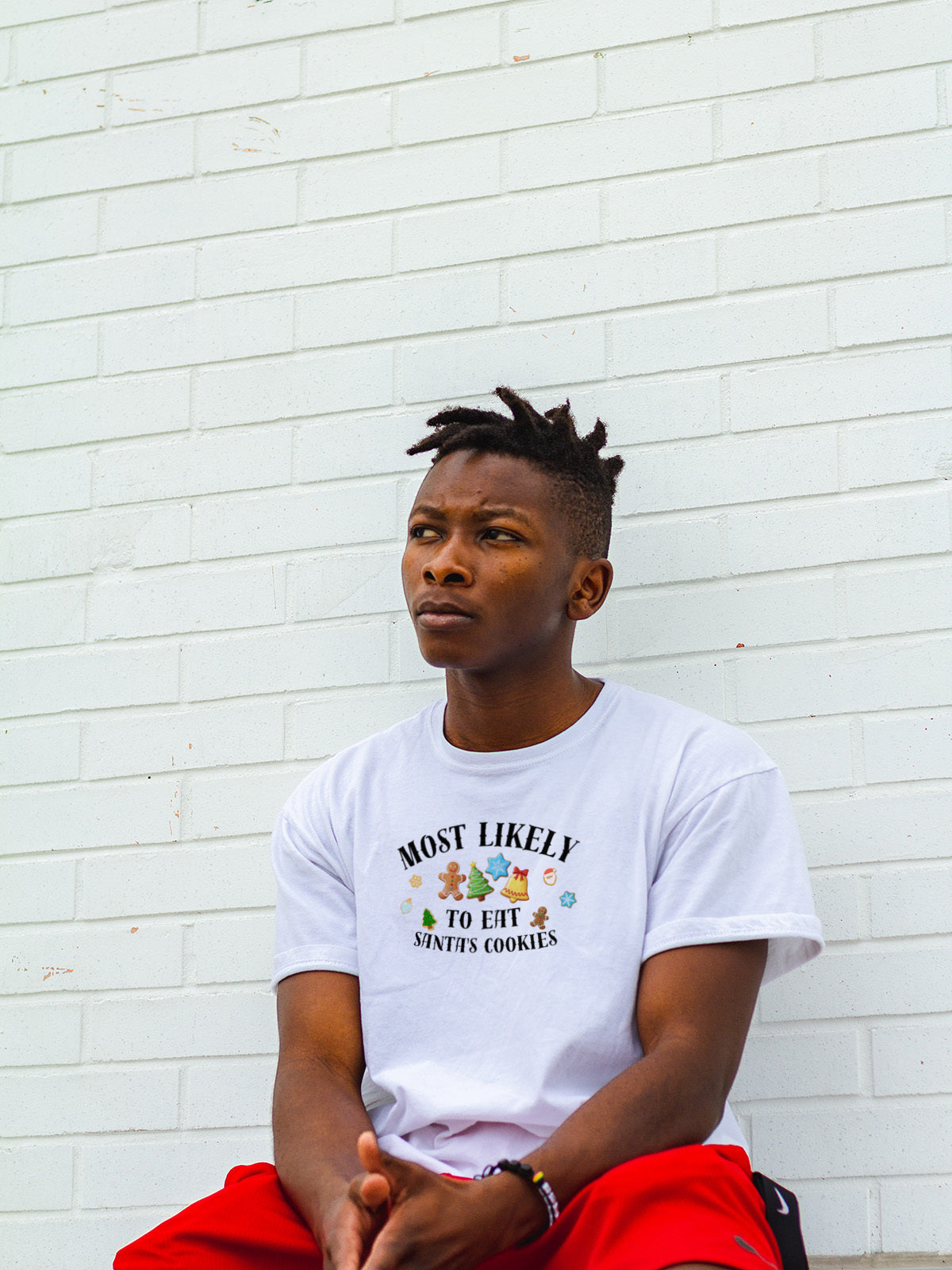 Most Likely to Eat Santa’s Cookies Christmas Tee — Fun Unisex Holiday T-Shirt with Cute Cookie Graphics | LAHall Artworks