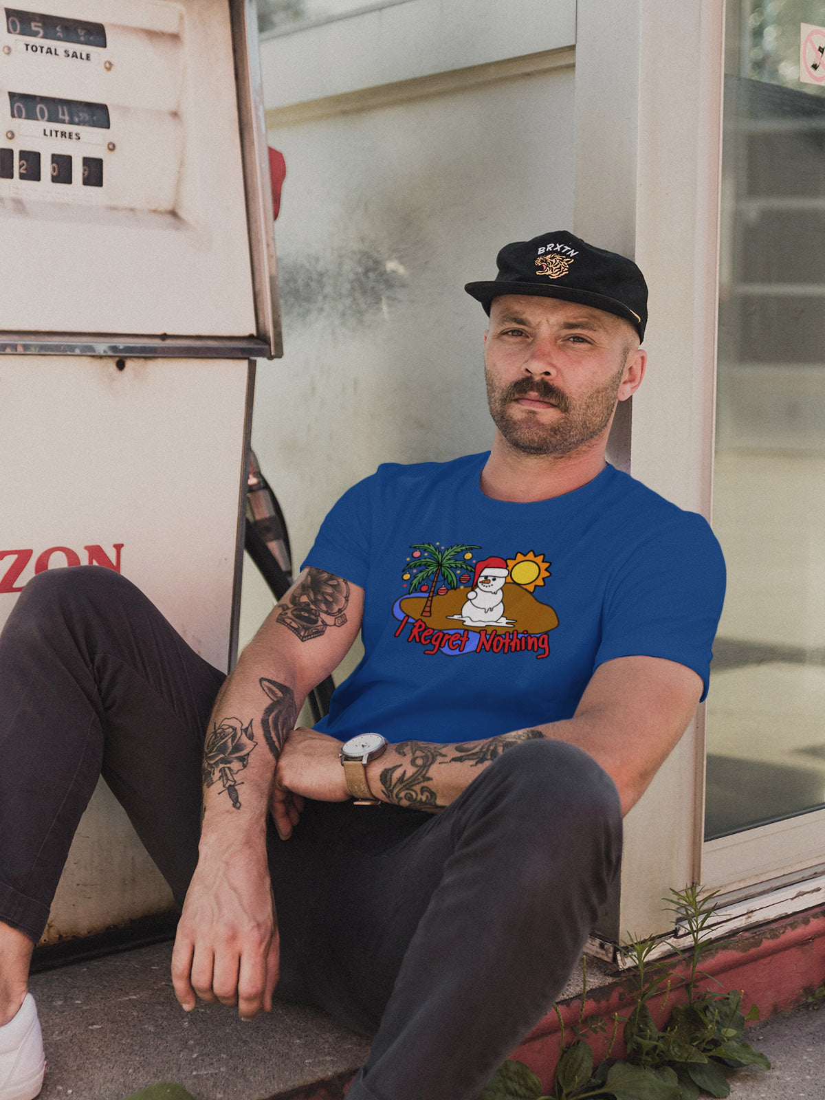 "I Regret Nothing" Melting Snowman Christmas Tee — LAHall Artworks Funny Tropical Holiday Unisex T-Shirt with Deserted Island Graphic | LAHall Artworks