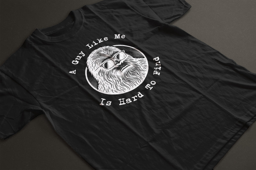 "A Guy Like Me Is Hard To Find" Bigfoot in Sunglasses Tee  | LAHall Artworks Graphic T-Shirt