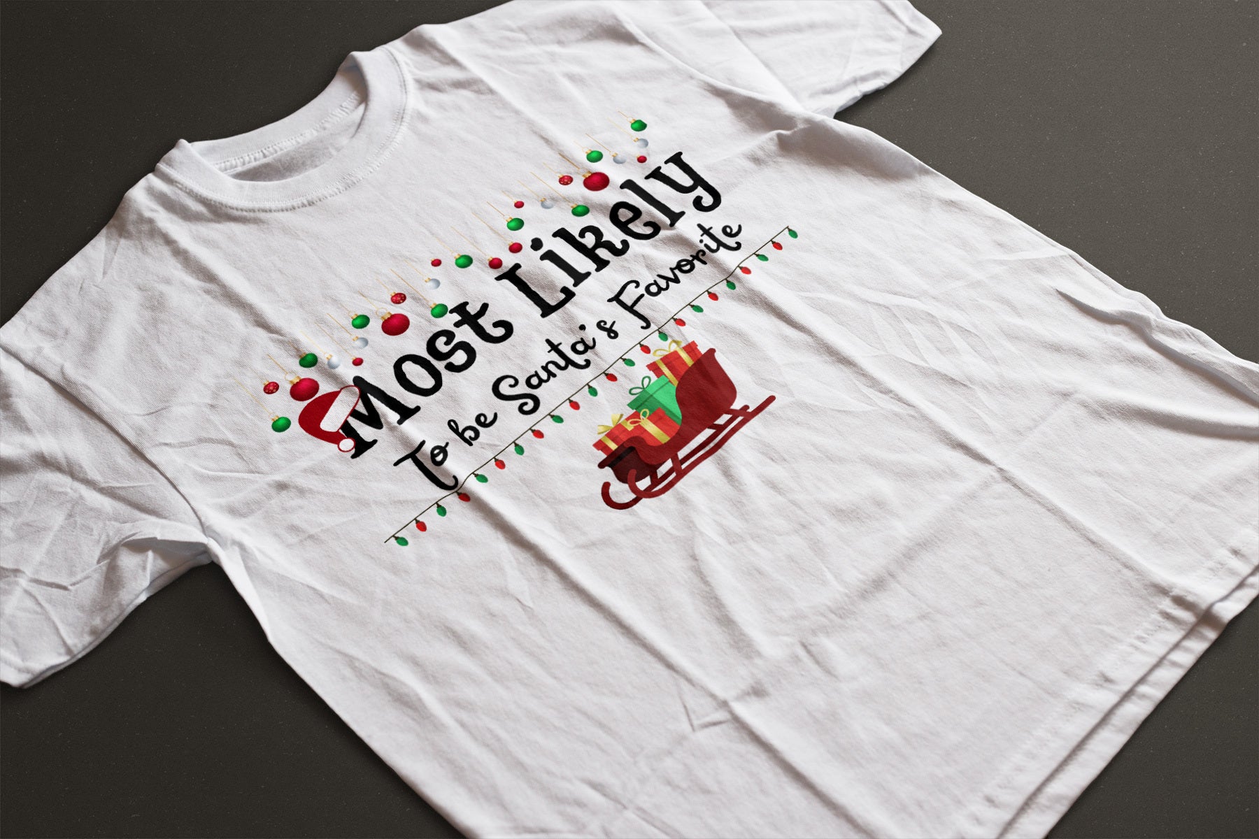 Most Likely to Be Santa’s Favorite Christmas Tee — Festive Unisex Holiday Shirt with Sleigh & Ornament Graphics | LAHall Artworks