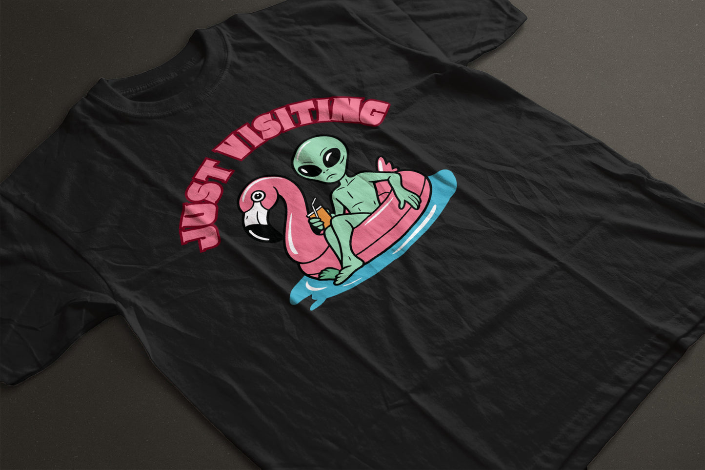 “Just Visiting” UFO Graphic Shirt - Funny Alien Flamingo Pool Float Tee | Retro Summer Vacation T-Shirt | LAHall Artworks