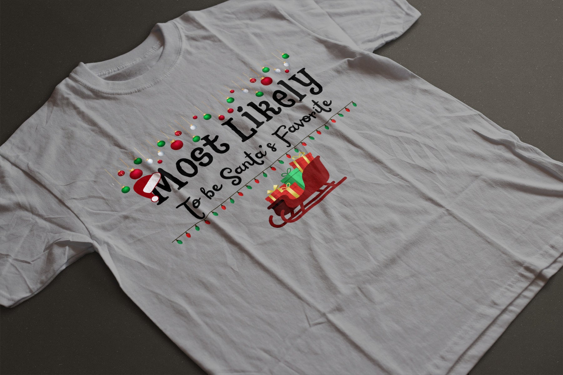 Most Likely to Be Santa’s Favorite Christmas Tee — Festive Unisex Holiday Shirt with Sleigh & Ornament Graphics | LAHall Artworks