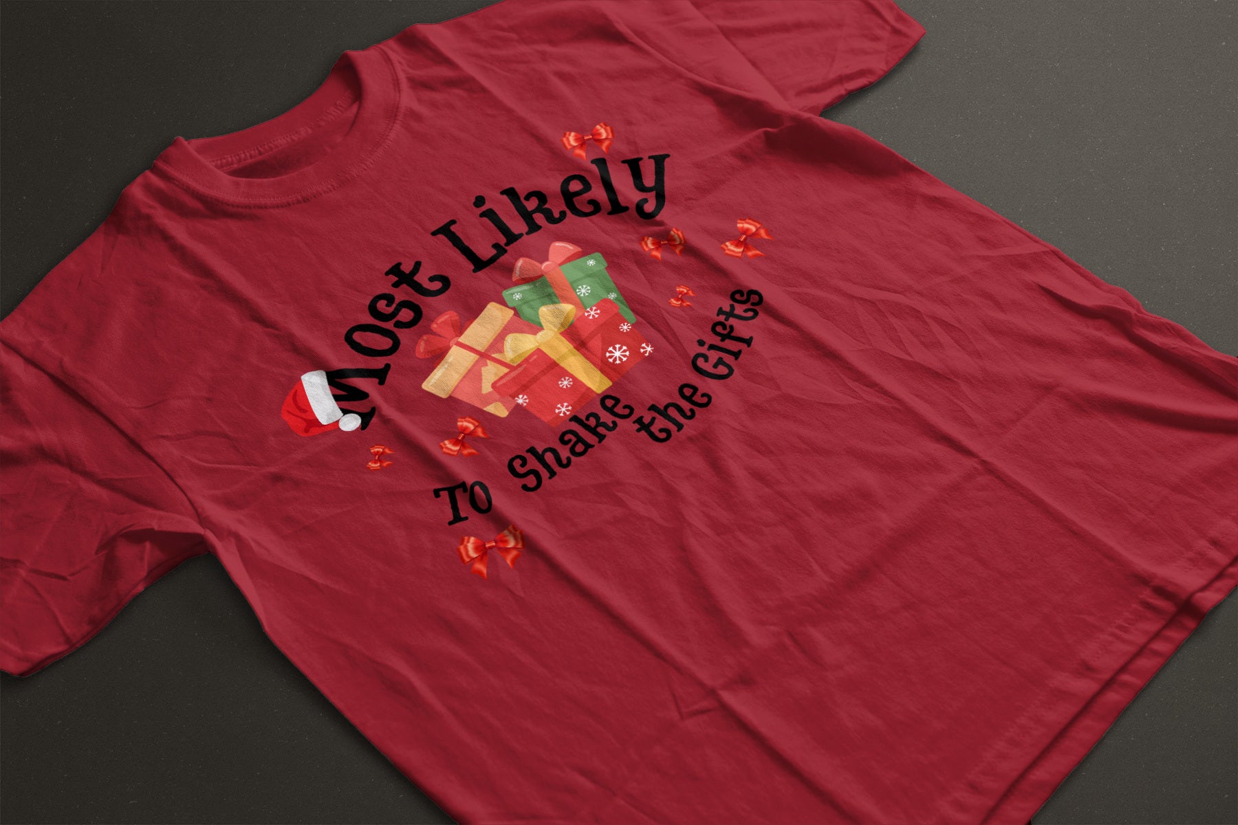 Most Likely to Shake the Gifts Christmas Tee — Fun Unisex Holiday Shirt with Gift & Bow Graphics | LAHall Artworks