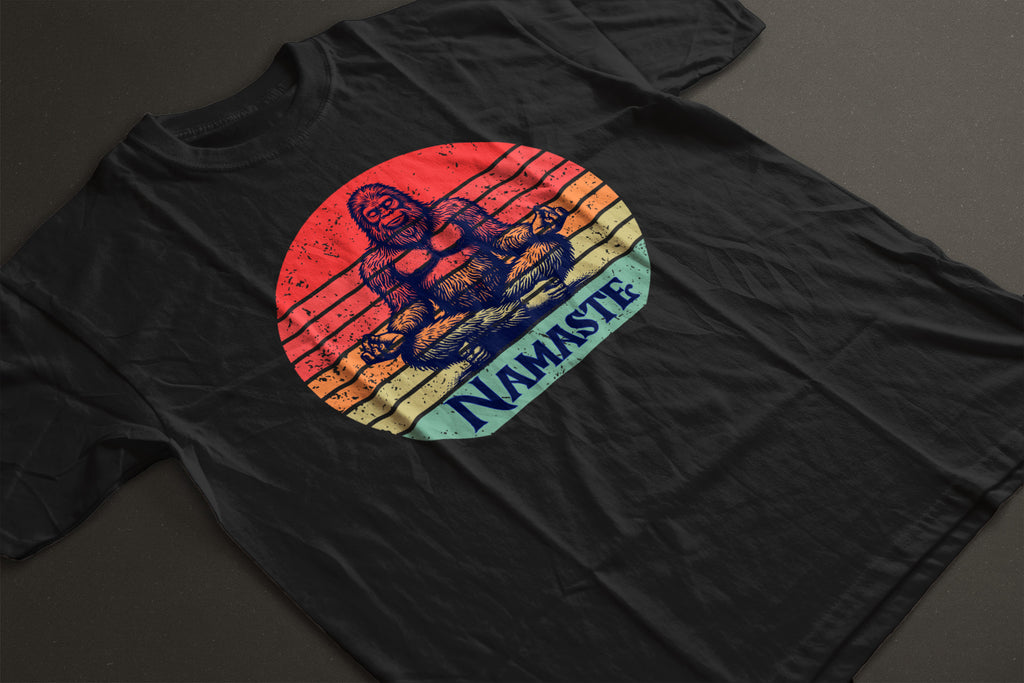"Namaste" Bigfoot Unisex Tee | Soft Sunset Meditation Sasquatch Graphic Shirt