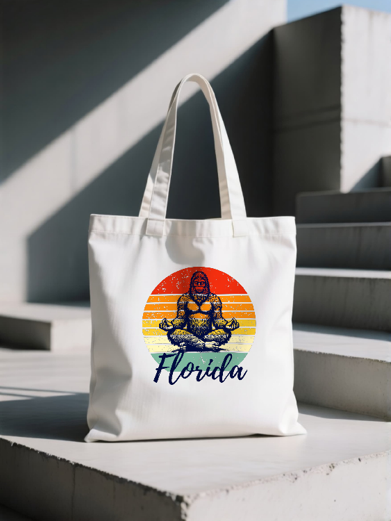 Florida Bigfoot Meditation Unisex Tote | Sunset Circle Sasquatch Graphic Tote